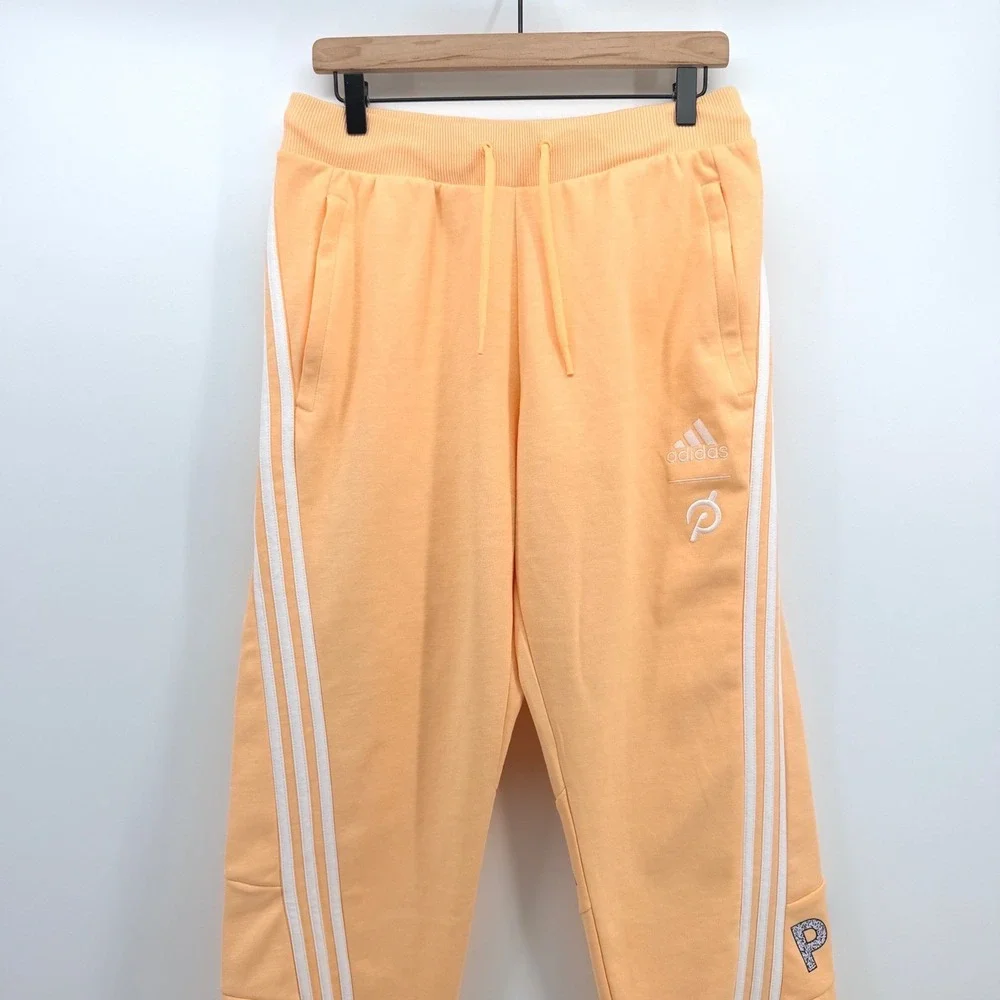 Adidas x Peloton Go Retro Jogger Pants Unisex M Acid Orange 3 Stripe Gym Lounge